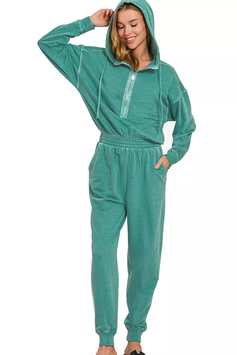 Zenana enzyme washed French terry jumpsuit front view second angle, model standing with arms down, soft relaxed cotton one piece, casual drape