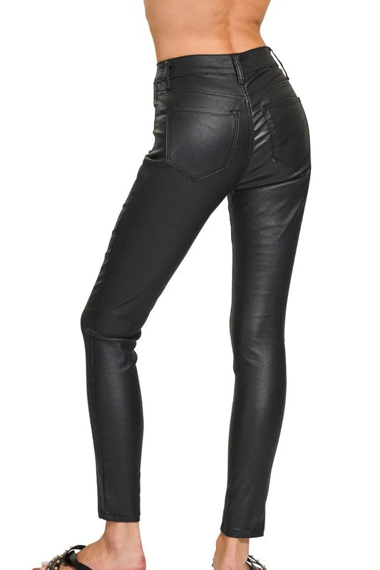 Back view of faux leather skinny pants, clean seam down center back, snug but comfortable fit through seat and thigh, pull-on style no zipper
