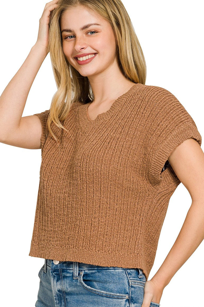 Zenana textured knit V-neck cropped sweater vest for women model standing facing side, side view of cropped knit vest, showing V-neckline and relaxed sleeveless fit