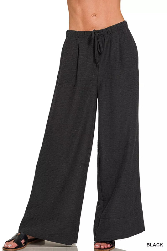 Front view of Zenana Woven Airflow Drawstring Pants featuring breathable fabric, drawstring waist, and relaxed summer fit