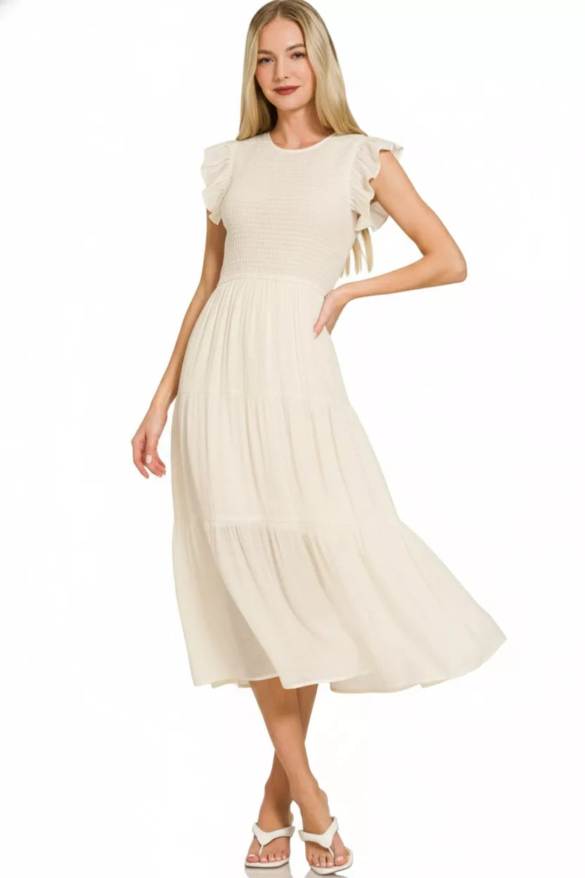 Back view of Zenana woven smocked ruffle sleeve midi dress showing relaxed fit, smocked detail, and ruffled sleeve design
